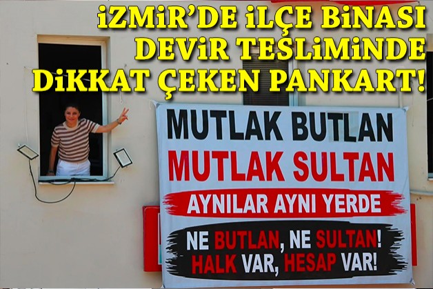İzmir'de ilçe binası devri sırasında dikkat çeken pankart