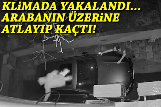 Klimada yakalanan hırsız, arabanın üzerine atladı!